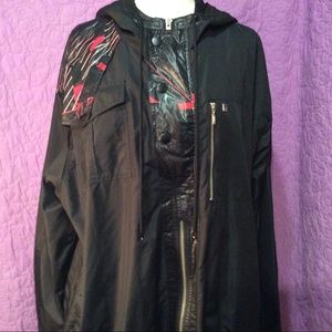 Rocawear lined zip up/half button up windbreaker.